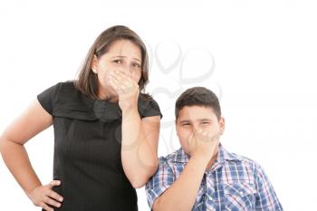 Mother and son holding their noses - bad smells in the air 