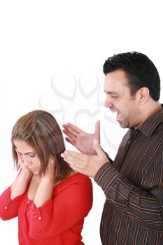 Portrait of a young woman gets earful from an annoyed man against white background 
