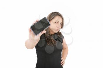 Young woman show display of mobile cell phone with black screen and smiling on a white background. Focus on woman