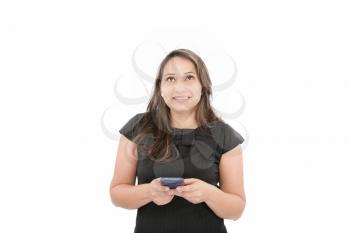 Portrait of happy young business woman text messaging on mobile phone smiling with braces
