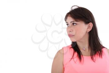 Portrait of a beautiful young woman looking away at copyspace against white background 