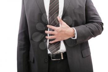 Businessman holding his stomach in pain or indigestion 