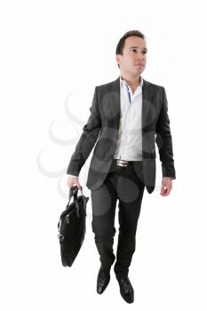 Portrait of a business man carrying a suitcase on white background 

