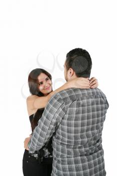 Happy loving couple hugging - isolated over a white background