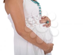 pregnant young woman isolated on a white 