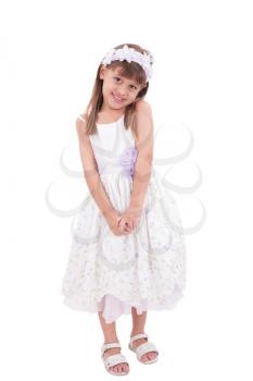smiling little girl in white dress 