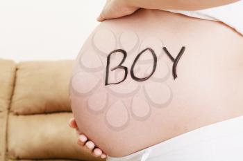 Word Boy written on Pregnant belly