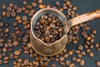 Royalty Free Photo of a Cup of Coffee Beans
