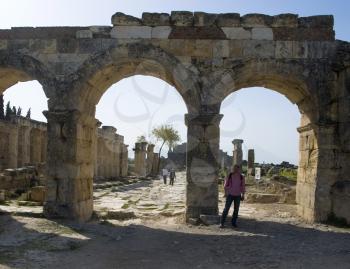 Royalty Free Photo of Tourists at a Ruin in Turkey