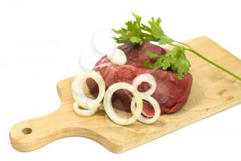 Royalty Free Photo of Meat on a Cutting Board