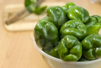 Royalty Free Photo of a Bowl of Green Peppers