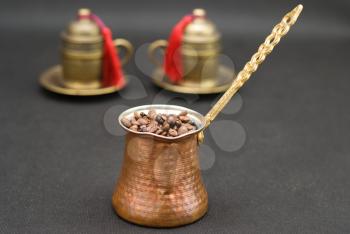 Royalty Free Photo of a Grinder and Coffee Beans