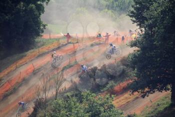 Motorcross competitors in the dust