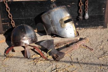 Antic helmets, chains and axe.