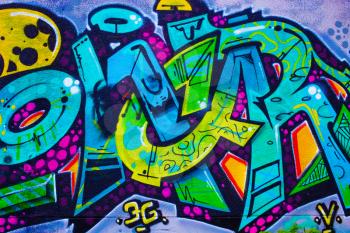 Detail of a colorful graffiti on a wall, abstract background