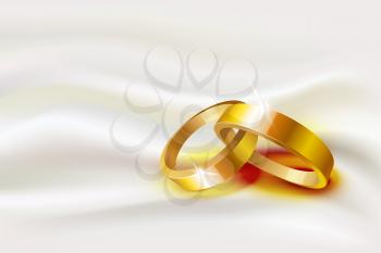 Vector illustration of two wedding rings on silk background