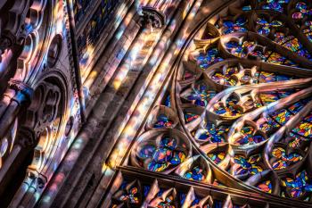 Saint-Malo, Brittany, France - Jan 15 2020 : Stained glasses and light in French cathedral Saint VIncent in  Saint-Malo