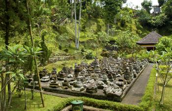 Ancient stone plate with stones on it in balinese temple