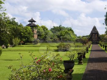 Taman Ayun Temple meadow in sunny weather, Mengwi, Bali, Indonesia