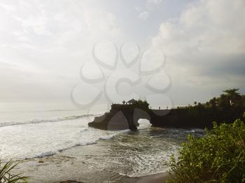 View on ocean coast at Tanah Lot area at sunset, Bali, Indonesia