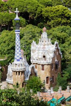 Barcelona’s Park Guell entrance pavilions in sunny day. Spain.