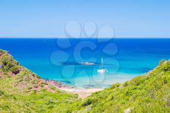 Cala del Pilar beach scenery in sunny day at Menorca, Spain.