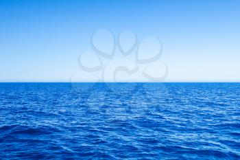 Mediterranean Sea blue seascape with clear horizon line and sky.