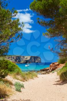View on Cala Algaiarens from sand pathway to the beach, Menorca island, Spain.