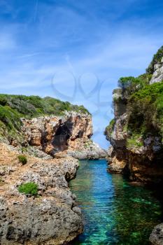 Cala de Rafalet cove in sunny day, Menorca island, Spain