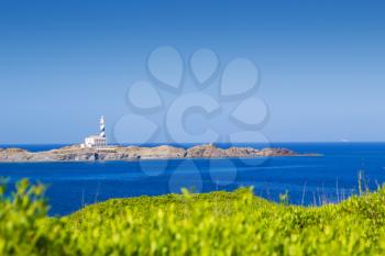 Cape Favaritx in sunny day at Menorca island, Spain.