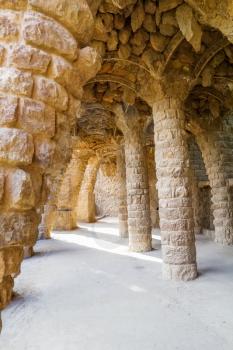 Famous stone colonnade in Parc Guell, Barcelona, Spain.