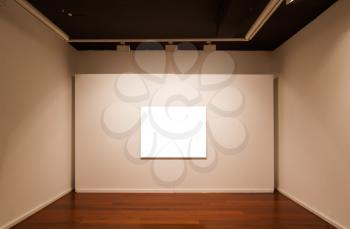 Art gallery interior with blank picture on the wall.