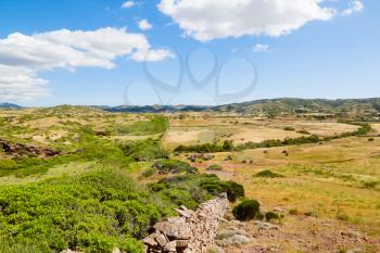 Menorca island field landscape with old traditional masonry fence, Balearic islands, Spain.