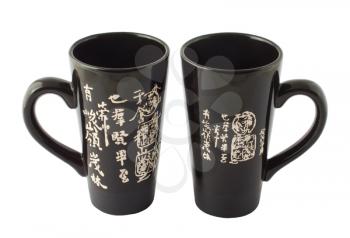 Royalty Free Photo of a Couple Cups With Chinese Writing