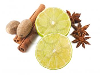 Royalty Free Photo of Limes Cinnamon Anise Stars and Nutmeg