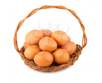 Royalty Free Photo of a Group of Chicken Eggs in a Basket