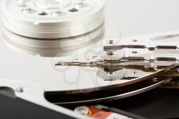 Royalty Free Photo of a Closeup of the Platters and Head of a Opened Computer Hard Drive 