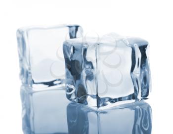 Royalty Free Photo of Two Reflected Ice Cubes