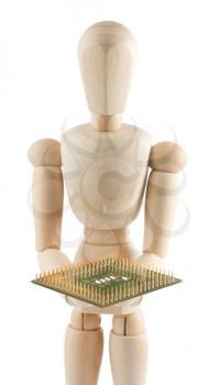Royalty Free Photo of a Wooden Mannequin Holding a Microchip