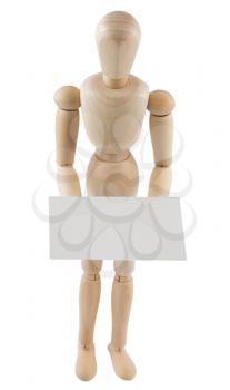 Royalty Free Photo of a Wooden Mannequin Holding a Blank Sign