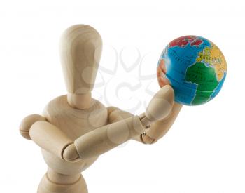 Royalty Free Photo of a Wooden Dummy with a Globe in its Hand