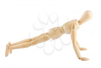 Royalty Free Photo of a Wooden Mannequin Doing Push-Ups