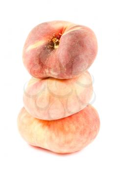 Three chinese flat peaches isolated on white background