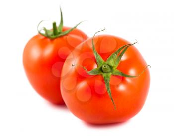 Two ripe red tomatoes isolated on white background