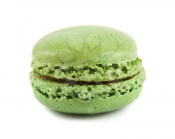 Single green macaroon isolated on white background