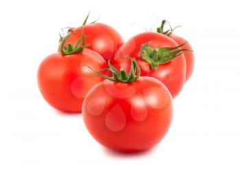 Five ripe tomatoes isolated on white background