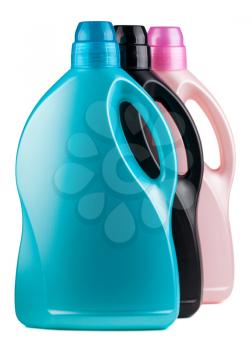 Three colorful plastic bottles isolated on white background