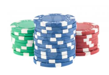 Three stacks of poker chips isolated on white background
