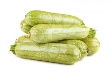 Heap of ripe vegetable marrows isolated on white background