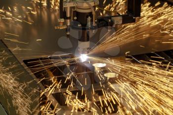 Plasma cutting metalwork industry machine with sparks